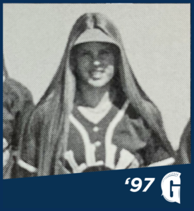 Athletics Hall of Fame member Monica Pardo posing after a softball game